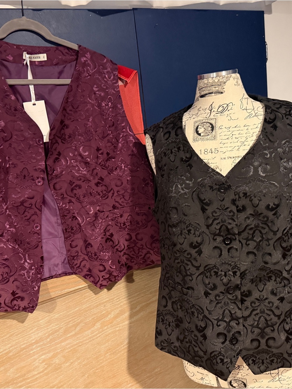Pair of women’s 3X Grace Karin vests in black and purple
